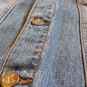 Mid blue faded denim trucker jacket